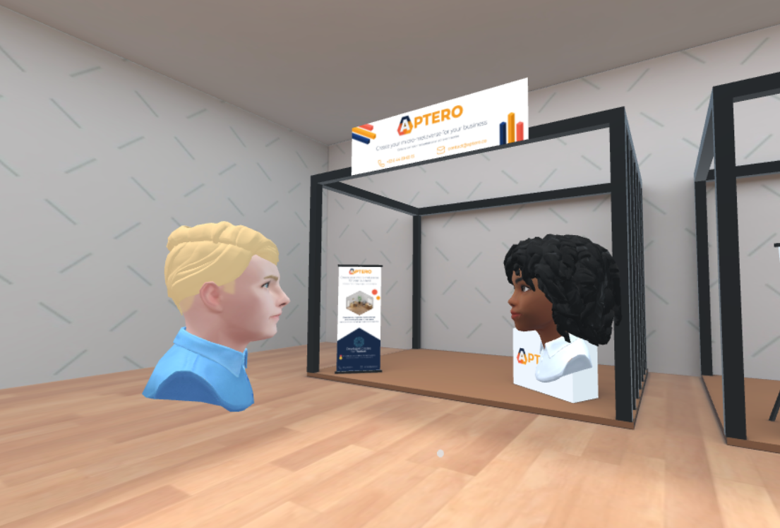 Two persons talking in Aptero Meet space