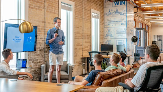 A man doing a presentation to a group